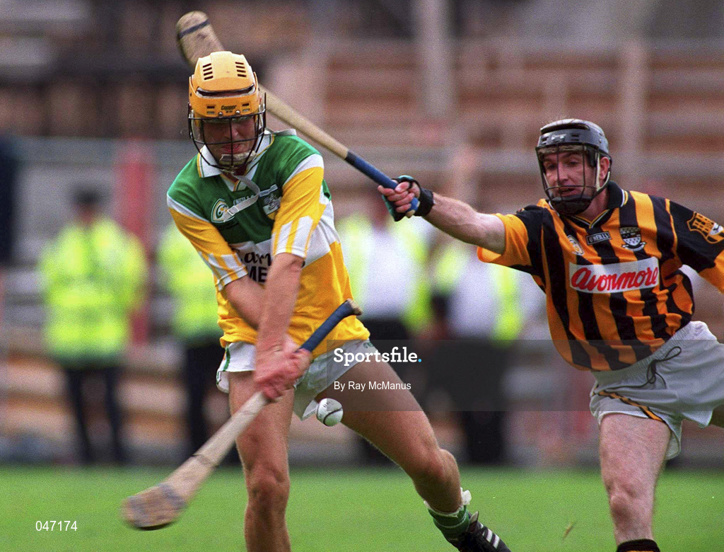 10 September 2000; Ger Oakley of Offaly in action against DJ Carey of Kilkenny during the pre match parade ahead of the All-Ireland Senior Hurling Championship Final match between Kilkenny and Offaly at Croke Park in Dublin. Photo by Ray McManus/Sportsfile