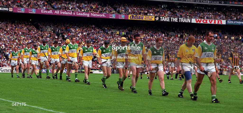 10 September 2000; Offaly captain Johnny Dooley leads his team during the pre match parade ahead of the All-Ireland Senior Hurling Championship Final match between Kilkenny and Offaly at Croke Park in Dublin. Photo by Ray McManus/Sportsfile