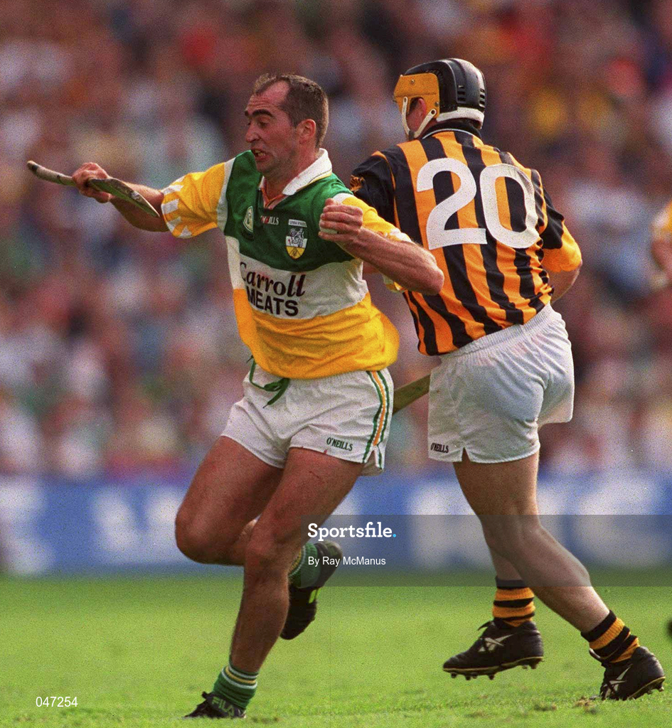 10 September 2000; Johnny Dooley of Offaly  is tackled by Canice Brennan of Kilkenny during the All-Ireland Senior Hurling Championship Final match between Kilkenny and Offaly at Croke Park in Dublin. Photo by Ray McManus/Sportsfile