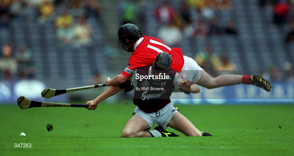 10 September 2000; Galway's Adrian Dinviney, in action against Conor Brosnan during the All-Ireland Minor Hurling Championship Final match between Cork and Galway at Croke Park in Dublin. Photo by Matt Browne/Sportsfile