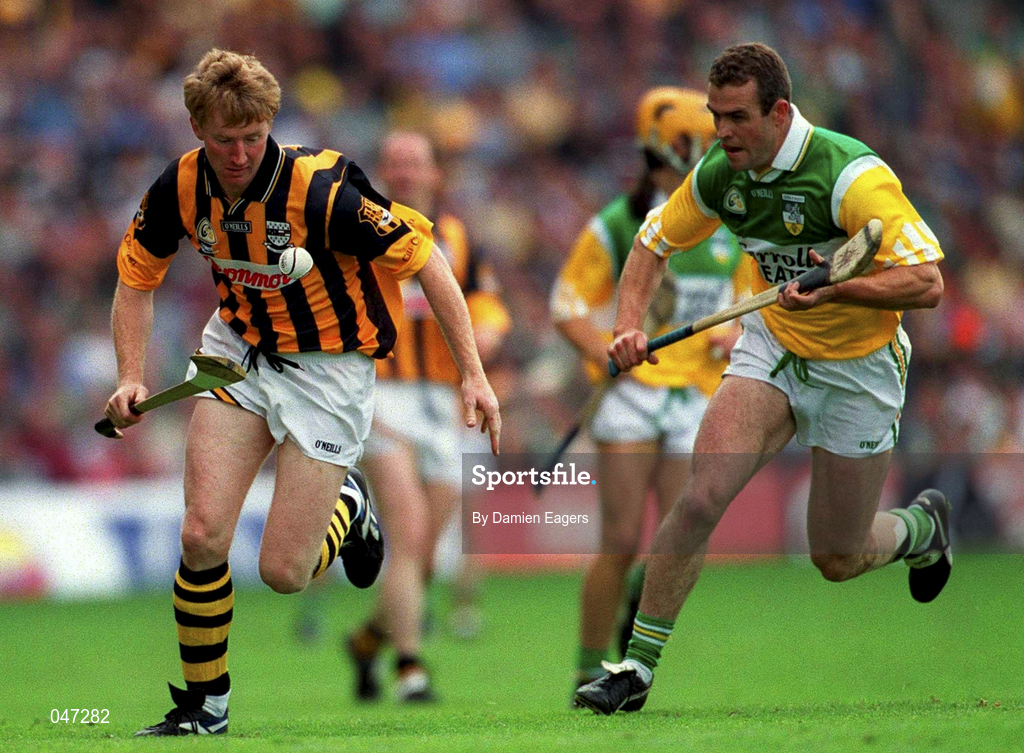 10 September 2000; John Powe of Kilkenny in action against Kevin Martin of Offaly during the All-Ireland Senior Hurling Championship Final match between Kilkenny and Offaly at Croke Park in Dublin. Photo by Damien Eagers/Sportsfile