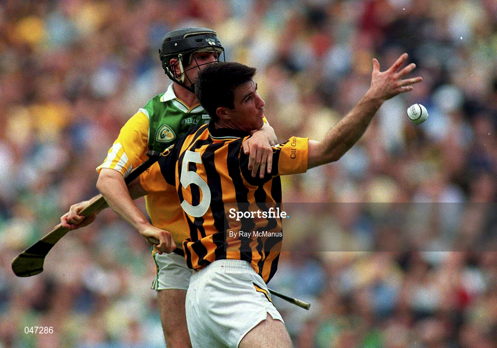 10 September 2000; Philip Larkin of Kilkenny in action against Gary Hannify of Offaly during the All-Ireland Senior Hurling Championship Final match between Kilkenny and Offaly at Croke Park in Dublin. Photo by Ray McManus/Sportsfile
