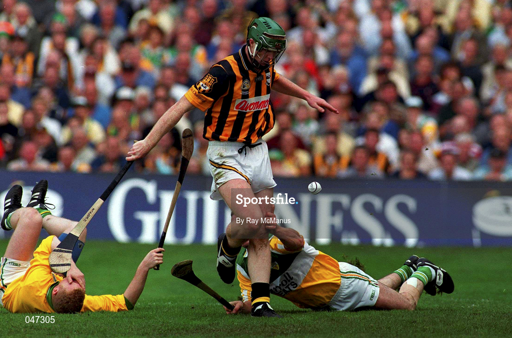 10 September 2000; Henry Shefflin of Kilkenny shoots to score his sides goal despite the efforts of Stephen Byrne, left, and Kevin Martin of Offaly during the All-Ireland Senior Hurling Championship Final match between Kilkenny and Offaly at Croke Park in Dublin. Photo by Ray McManus/Sportsfile