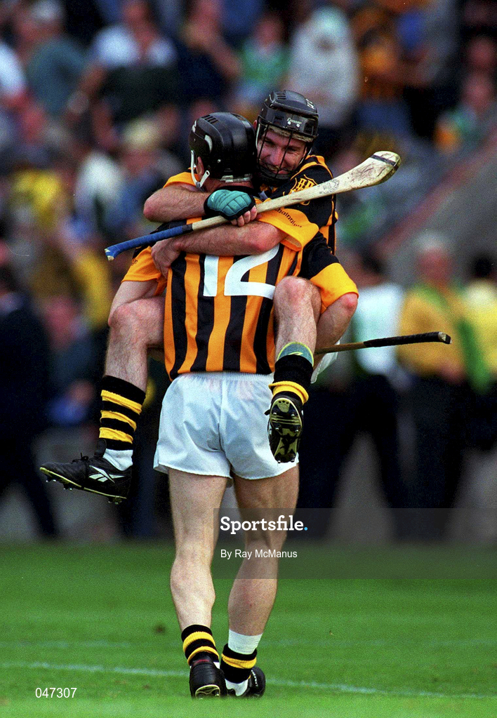10 September 2000; Kilkenny's DJ Carey celebrates with team mate Denis Byrne after the All-Ireland Senior Hurling Championship Final match between Kilkenny and Offaly at Croke Park in Dublin. Photo by Ray McManus/Sportsfile