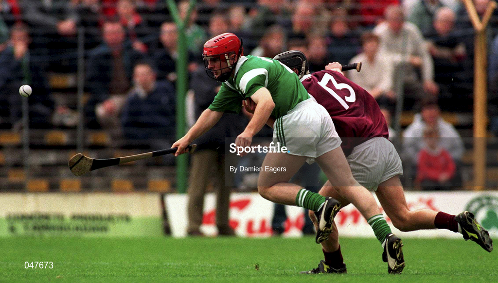 17 September 2000; Damien Reale of Limerick in action against Damien Joyce of Galway during the All Ireland Under-21 Hurling Championship Final match between Galway and Limerick at Semple Stadium in Thurles, Tipperary. Photo by Damien Eagers/Sportsfile