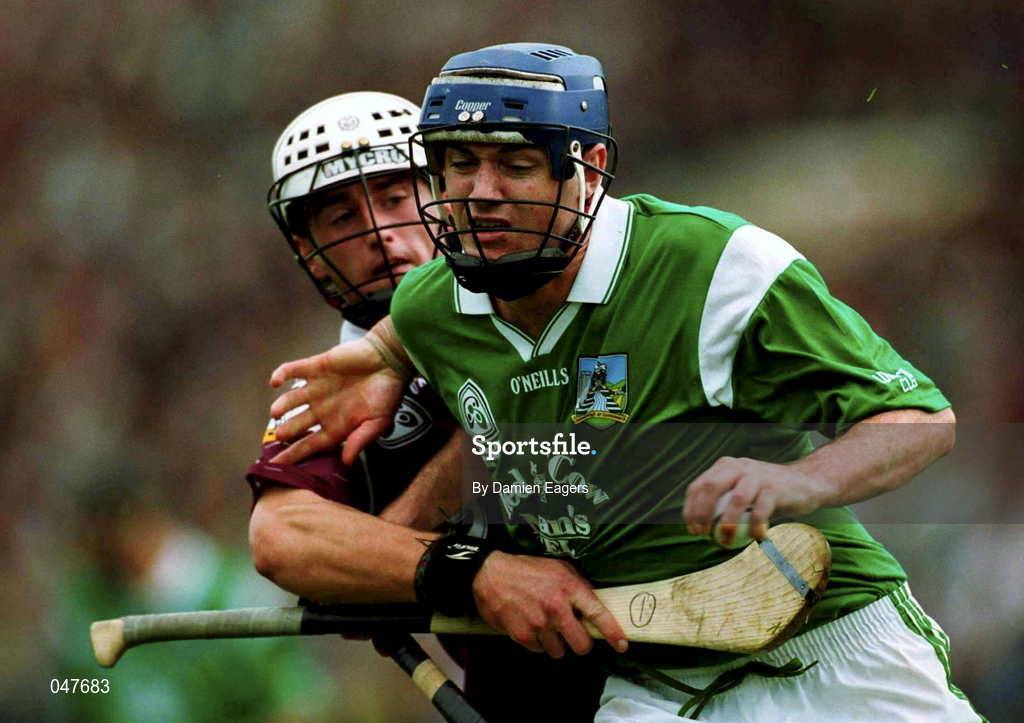 17 September 2000; Brian Geary of Limerick in action against Sean O'Connor of Galway during the All Ireland Under-21 Hurling Championship Final match between Galway and Limerick at Semple Stadium in Thurles, Tipperary. Photo by Damien Eagers/Sportsfile