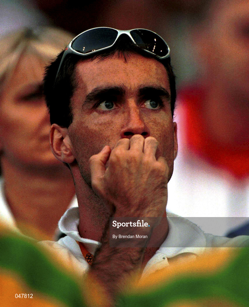 22 September 2000; Ireland's Mark Carroll looks on anxiously as he watches Sonia O'Sullivan's heat of the Women's 5000m from the stands. Stadium Australia, Sydney Olympic Park. Homebush Bay, Sydney, Australia. Photo by Brendan Moran/Sportsfile