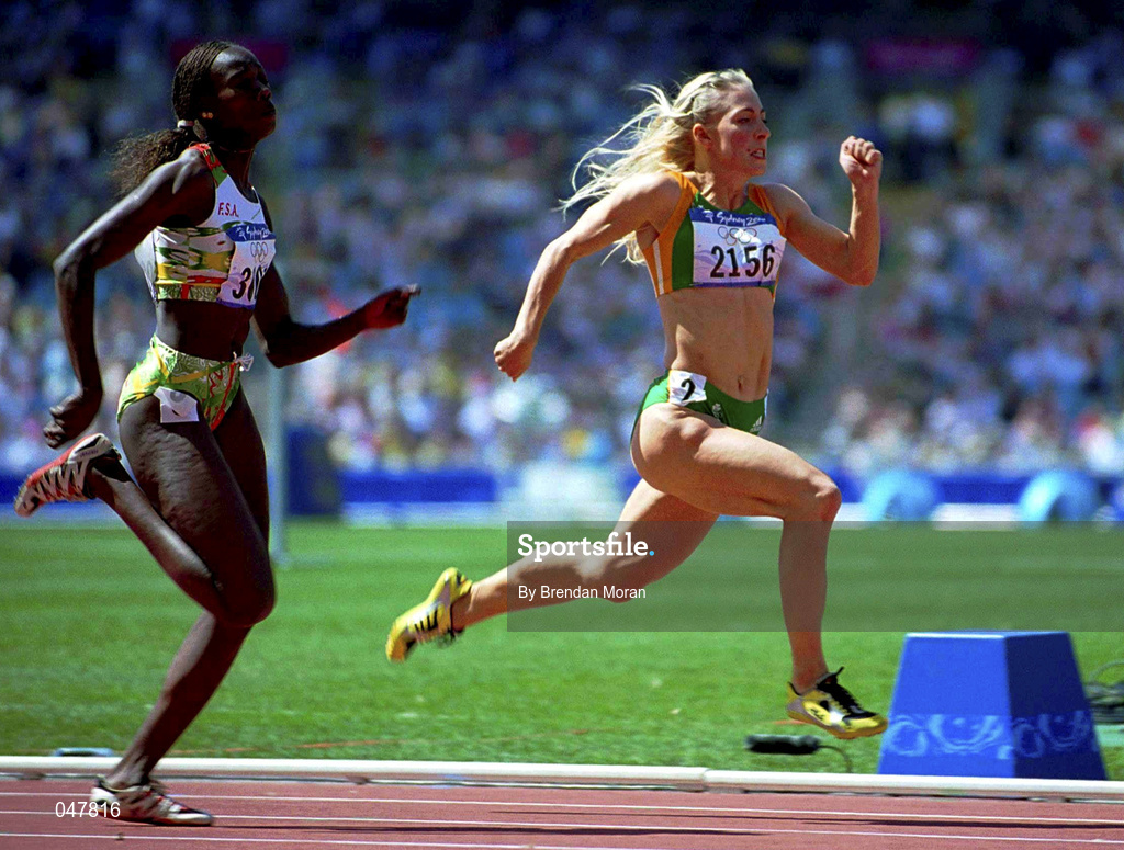 22 September 2000; Ireland's Sarah Reilly, right, sprints clear of Senegal's Aminata Diouf on her way to qualifying for the second round of the Women's 100m heats. Stadium Australia, Sydney Olympic Park, Homebush Bay, Sydney, Australia. Photo by Brendan Moran/Sportsfile
