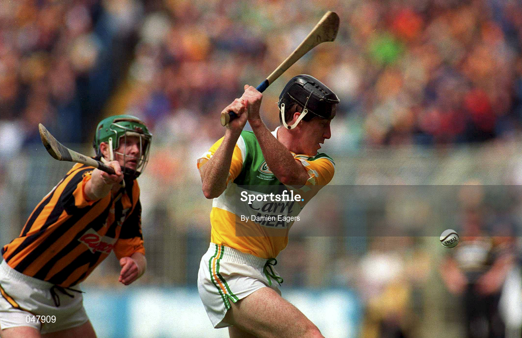 9 July 2000; Brian Whelahan of Offaly clears ahead of Henry Shefflin of Kilkenny during the Guinness Leinster Senior Hurling Championship Final match between Kilkenny and Offaly at Croke Park in Dublin. Photo by Damien Eagers/Sportsfile