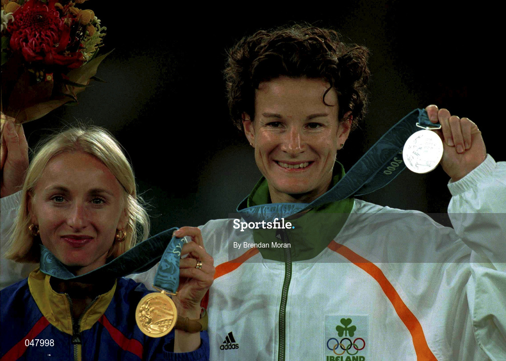 25 September 2000;  Ireland's Sonia O'Sullivan, right,  with her silver medal pictured alongside Romania's Gabriela Szabo who won Gold in the Women's 5000m Final. Stadium Australia, Sydney Olympic Park. Homebush Bay, Sydney, Australia. Photo by Brendan Moran/Sportsfile