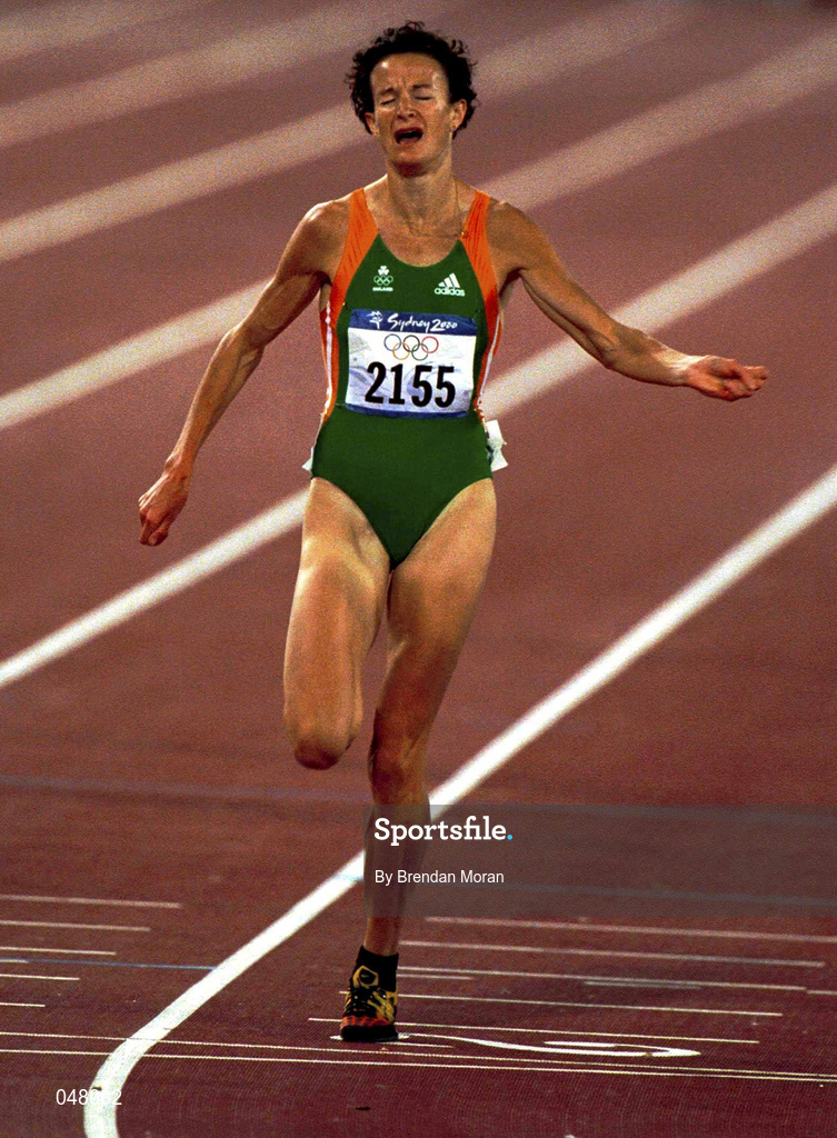 25 September 2000; Ireland's Sonia O'Sullivan crosses the finishing line to claim the silver medal in the Women's 5000m. Stadium Australia, Sydney Olympic Park. Homebush Bay, Sydney, Australia.  Photo by Brendan Moran/Sportsfile