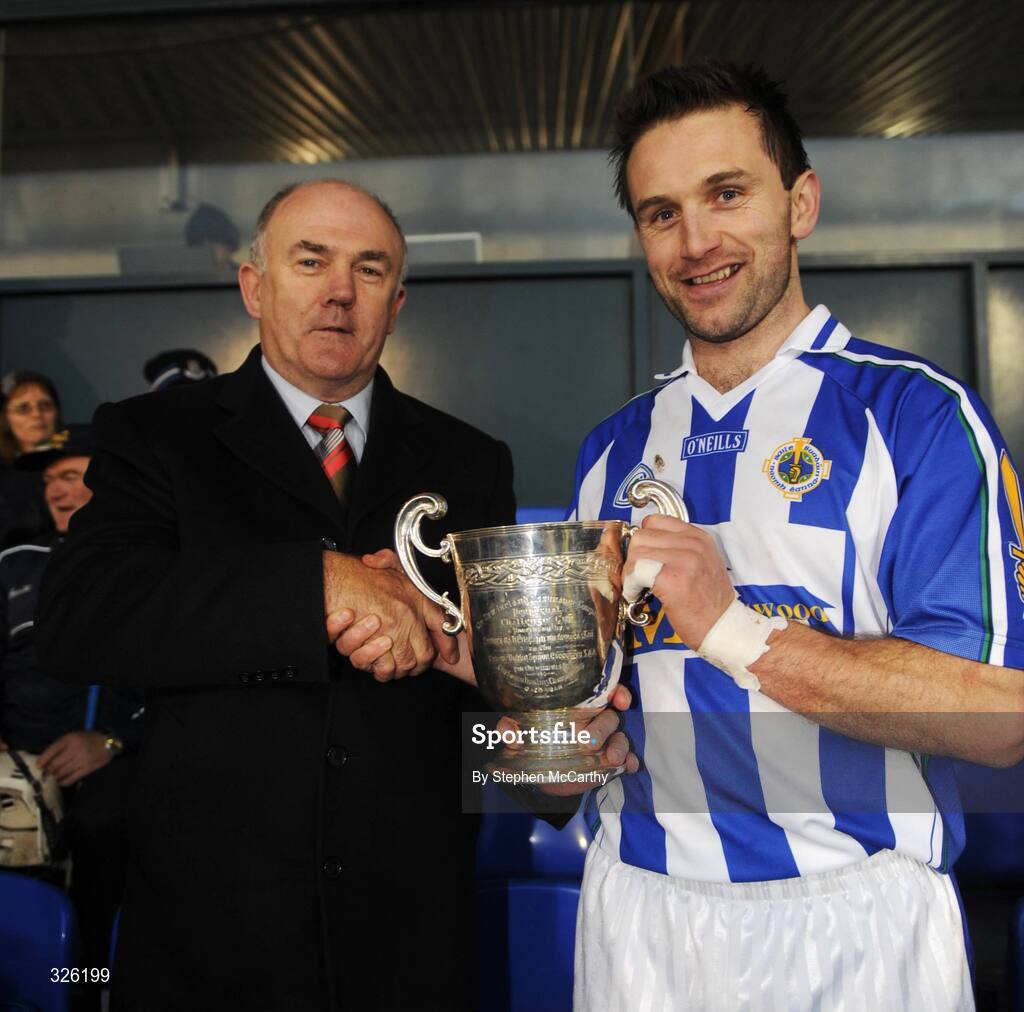 1 November 2008; Ballyboden St Endas captain David Sweeney is presented with the cup by Dublin County Board Chairman Gerry Harrington. Dublin Senior Hurling Final, Ballyboden St Endas v Kilmacud Crokes. Parnell Park, Dublin. Picture credit: Stephen McCarthy / SPORTSFILE