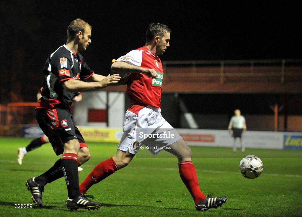 4 November 2008; David Partridge, St. Patrick’s Athletic, in action against Lawrie Dudfield, Cork City. eircom League of Ireland Premier Division, St. Patrick’s Athletic v Cork City, Richmond Park, Dublin. Picture credit: Brian Lawless / SPORTSFILE