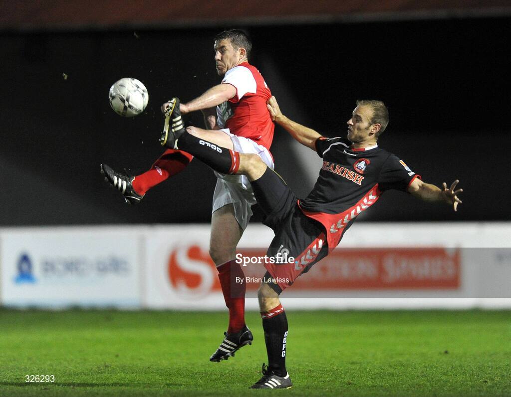 4 November 2008; David Partridge, St. Patrick’s Athletic, in action against Lawrie Dudfield, Cork City. eircom League of Ireland Premier Division, St. Patrick’s Athletic v Cork City, Richmond Park, Dublin. Picture credit: Brian Lawless / SPORTSFILE
