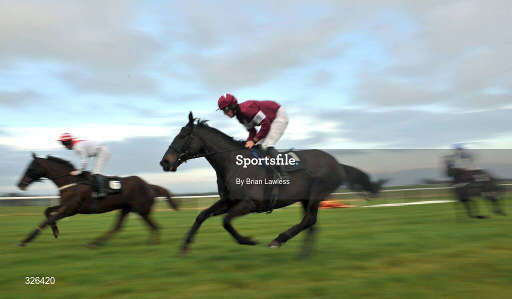 6 November 2008; War of Attrition, with Davy Russell up, centre, on the way to winning the Thurles Steeplechase alongside eventual 4th Strong Project, John Allen up. Thurles Racecourse, Thurles, Co. Tipperary. Picture credit: Brian Lawless / SPORTSFILE