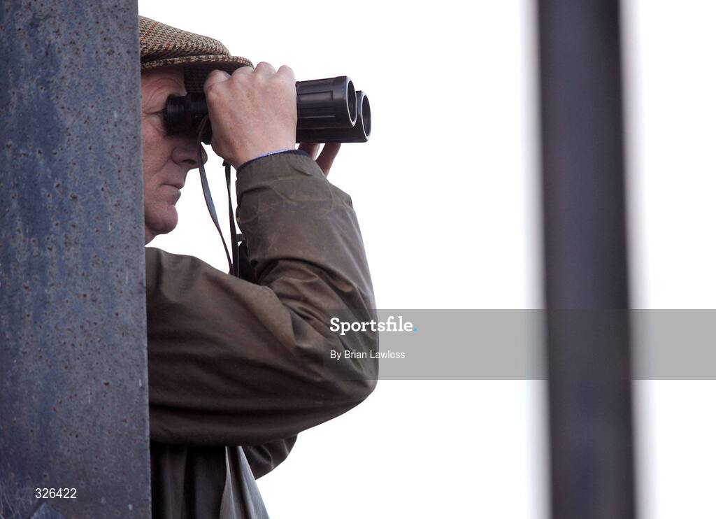 6 November 2008; A punter keeps an eye on the action during the Thurles Steeplechase. Thurles Racecourse, Thurles, Co. Tipperary. Picture credit: Brian Lawless / SPORTSFILE