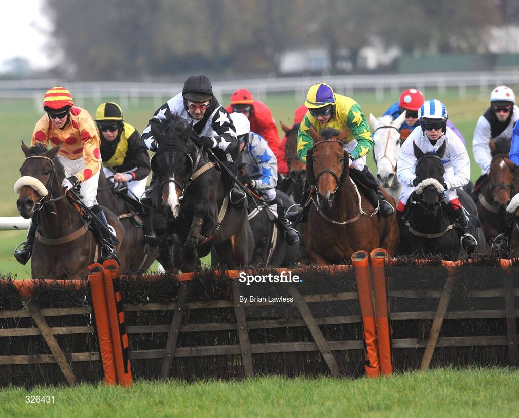 6 November 2008; Arkmore Radar, with Edward Power up, left, amongst the 'runners and riders' on the way to winning the Holycross Handicap Hurdle. Thurles Racecourse, Thurles, Co. Tipperary. Picture credit: Brian Lawless / SPORTSFILE