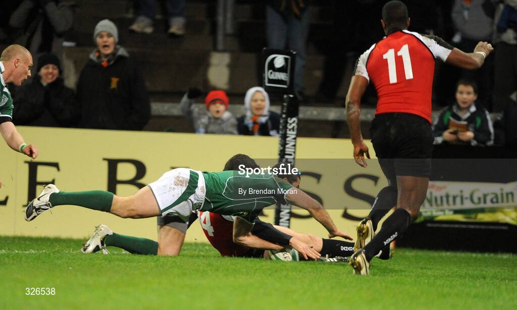 8 November 2008; Ireland's Rob Kearney touches down for his side's second try of the game despite the attention of Canada's Ciaran Hearn. Guinness Autumn Internationals, Ireland v Canada, Thomond Park, Limerick. Picture credit: Brendan Moran / SPORTSFILE