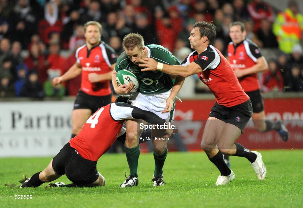 8 November 2008; Ireland's Luke Fitzgerald is tackled by  Canada's Ciaran Hearn, left, and Ed Faiehurst. Guinness Autumn Internationals, Ireland v Canada, Thomond Park, Limerick. Picture credit: Matt Browne / SPORTSFILE