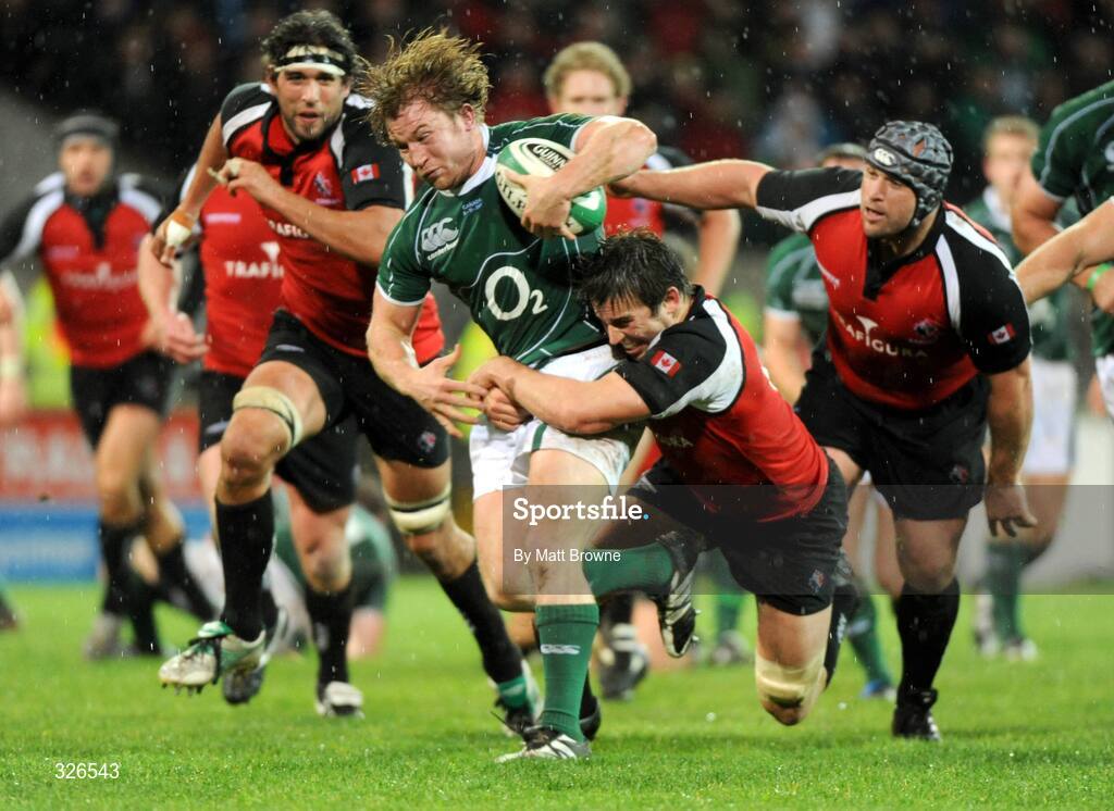 8 November 2008; Ireland's Jerry Flannery is tackled by Canada's Sean-Michaels Stephen, left, and Mike Burak. Guinness Autumn Internationals, Ireland v Canada, Thomond Park, Limerick. Picture credit: Matt Browne / SPORTSFILE