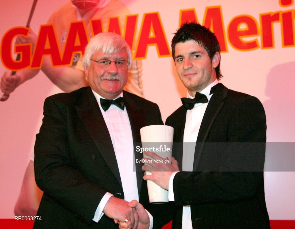 1 November 2008; Cushendall Ruairi Og's hurler Shane McNaughton, right, is presented with the October Tennent’s/Ulster GAA Writers’ Award by Ray McElroy, Inbev Ireland, at the Ulster GAA Writers’ banquet in the The Hillgrove Hotel, Leisure & Spa, Monaghan. Shane has been in the Cushendall senior panel since the age of 15 and has been three years in the Antrim senior squad. To date, he has won two Ulster and three Antrim senior medals plus three Ulster Minor awards and a Walsh Cup medal. The Hillgrove Hotel, Leisure & Spa, Monaghan. Picture credit: Oliver McVeigh / SPORTSFILE