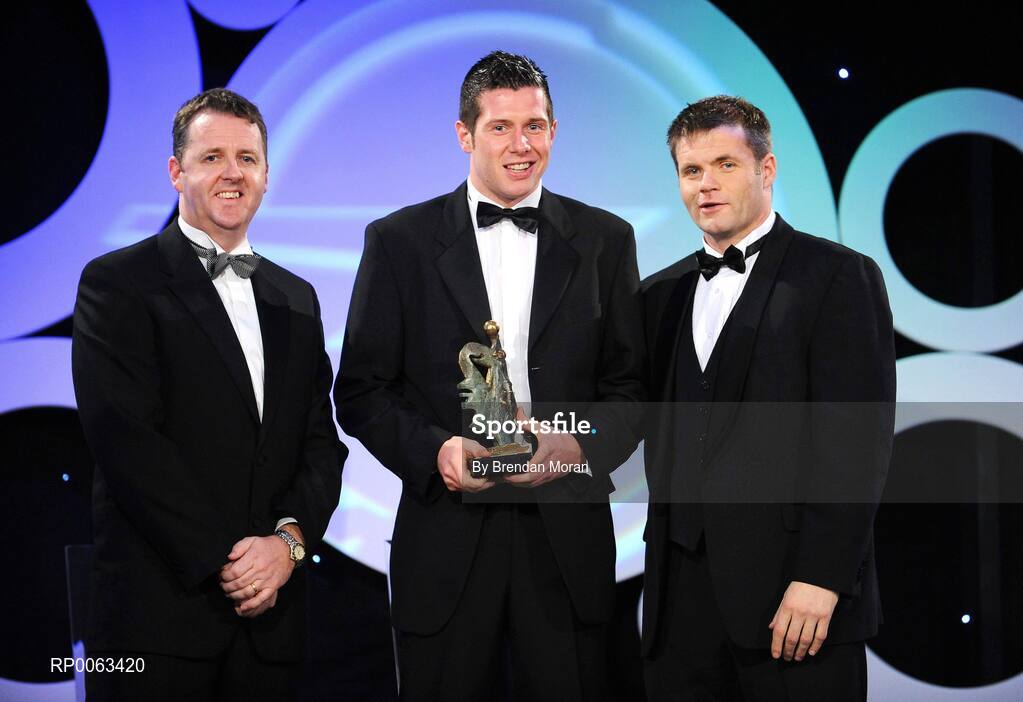 7 November 2008; Sean Cavanagh, of Tyrone, is presented with his Opel Gelic Players footballer of the year award by Dave Sheeran, Managing Director, OPEL Ireland, left, and Dessie Farrell, Chief Executive, Gaelic Players Association, during the 2008 Opel Gaelic Players of the Year awards for Hurling and Football. Citywest Hotel, Conference, Leisure & Golf Resort, Dublin. Picture credit: Brendan Moran / SPORTSFILE