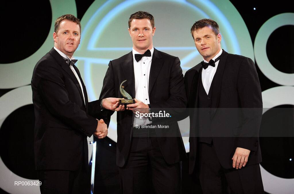 7 November 2008; Conor Gormley, of Tyrone, is presented with his GPA award by Dave Sheeran, Managing Director, OPEL Ireland, left, and Dessie Farrell, Chief Executive, Gaelic Players Association, during the 2008 Opel Gaelic Players of the Year awards for Hurling and Football. Citywest Hotel, Conference, Leisure & Golf Resort, Dublin. Picture credit: Brendan Moran / SPORTSFILE