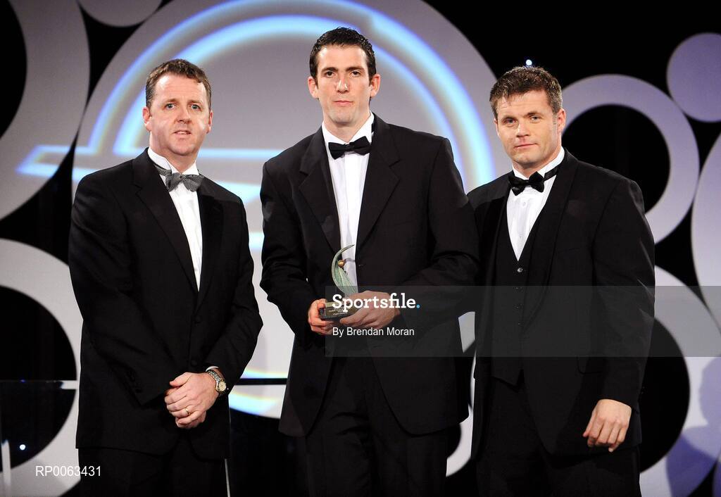 7 November 2008; Justin McMahon, of Tyrone, is presented with his GPA award by Dave Sheeran, Managing Director, OPEL Ireland, left, and Dessie Farrell, Chief Executive, Gaelic Players Association, during the 2008 Opel Gaelic Players of the Year awards for Hurling and Football. Citywest Hotel, Conference, Leisure & Golf Resort, Dublin. Picture credit: Brendan Moran / SPORTSFILE