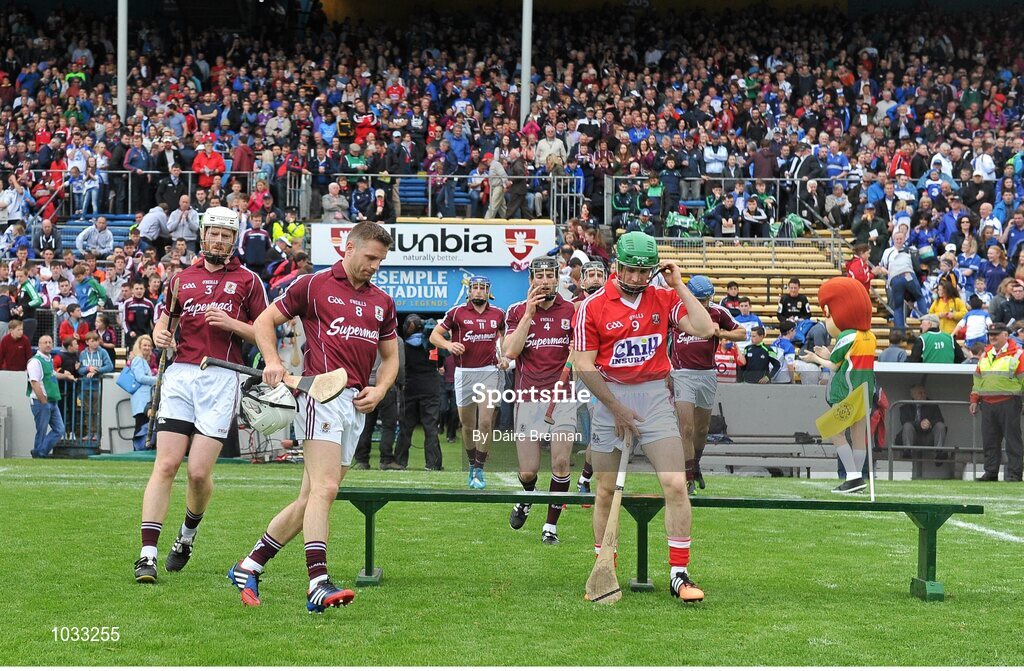 26 July 2015; Daniel Kearney, Cork, fixes his helmet as the Galway team come out for the team photograph. GAA Hurling All-Ireland Senior Championship, Quarter-Final, Galway v Cork. Semple Stadium, Thurles, Co. Tipperary. Picture credit: Dáire Brennan / SPORTSFILE