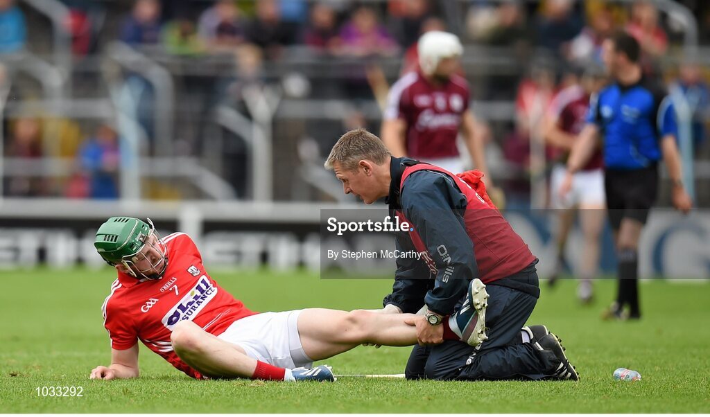 26 July 2015; Cormac Murphy, Cork, is treated for an injury. GAA Hurling All-Ireland Senior Championship, Quarter-Final, Galway v Cork. Semple Stadium, Thurles, Co. Tipperary. Picture credit: Stephen McCarthy / SPORTSFILE