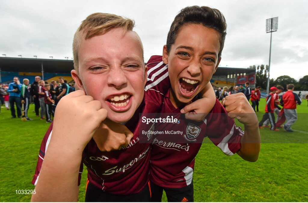 26 July 2015; Galway supporters Patrick O'Halloran, age 11, left, and Luke McClean, age 13, celebrate Galway's win. GAA Hurling All-Ireland Senior Championship, Quarter-Final, Galway v Cork. Semple Stadium, Thurles, Co. Tipperary. Picture credit: Stephen McCarthy / SPORTSFILE