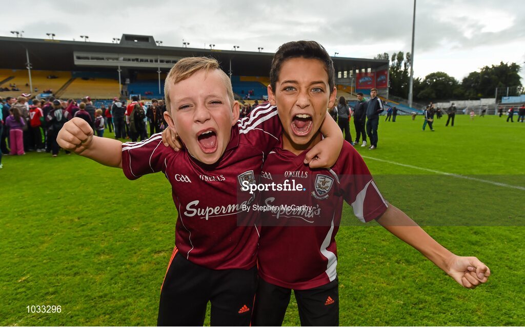 26 July 2015; Galway supporters Patrick O'Halloran, age 11, left, and Luke McClean, age 13, celebrate Galway's win. GAA Hurling All-Ireland Senior Championship, Quarter-Final, Galway v Cork. Semple Stadium, Thurles, Co. Tipperary. Picture credit: Stephen McCarthy / SPORTSFILE