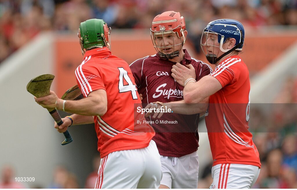 26 July 2015; Joe Canning, Galway, in a tussle with Stephen McDonnell, 4, and Damien Cahalane, Cork. GAA Hurling All-Ireland Senior Championship, Quarter-Final, Galway v Cork. Semple Stadium, Thurles, Co. Tipperary. Picture credit: Piaras Ó Mídheach / SPORTSFILE
