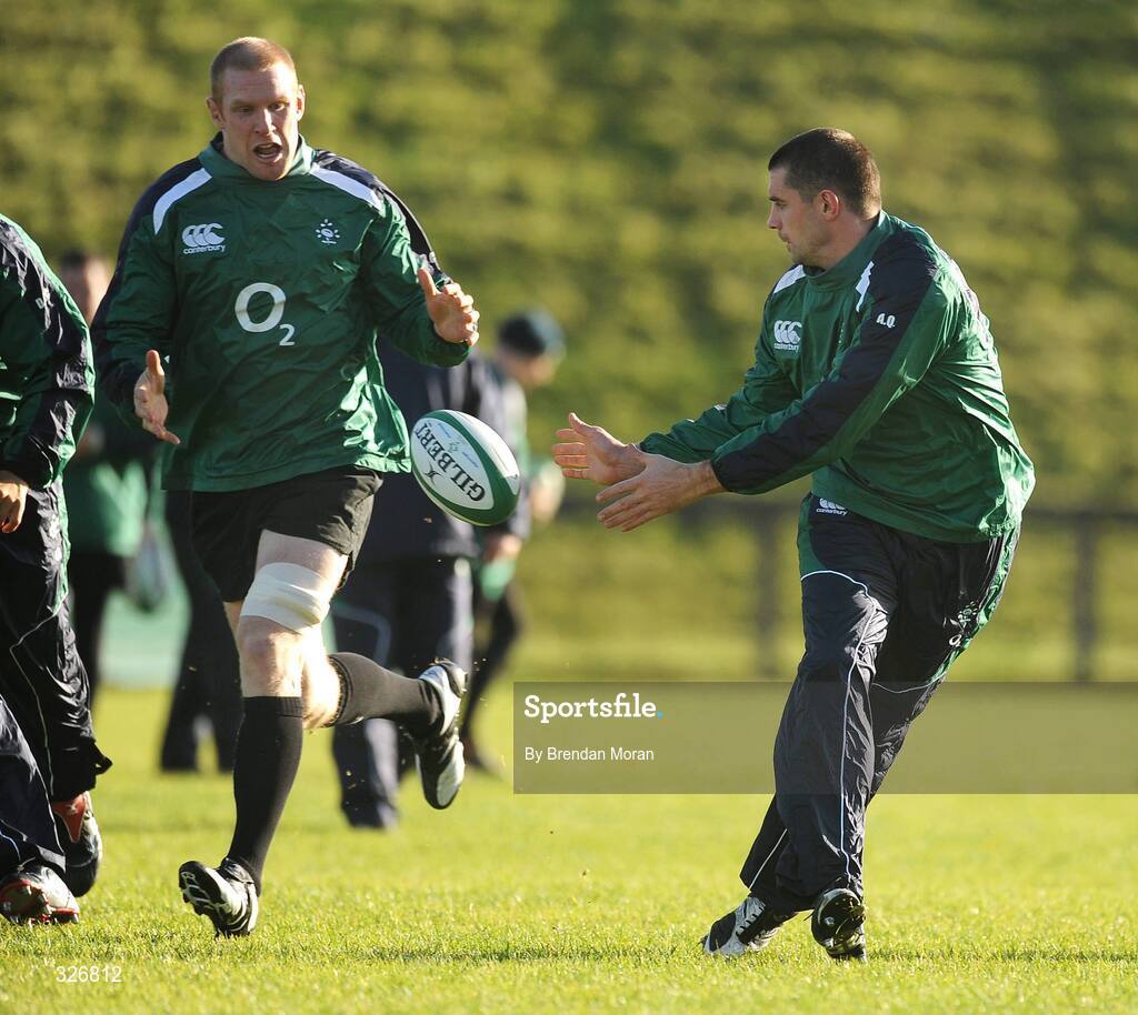 10 November 2008; Ireland's Alan Quinlan passes to team-mate Paul O'Connell during rugby squad training. University of Limerick, Limerick. Picture credit: Brendan Moran / SPORTSFILE