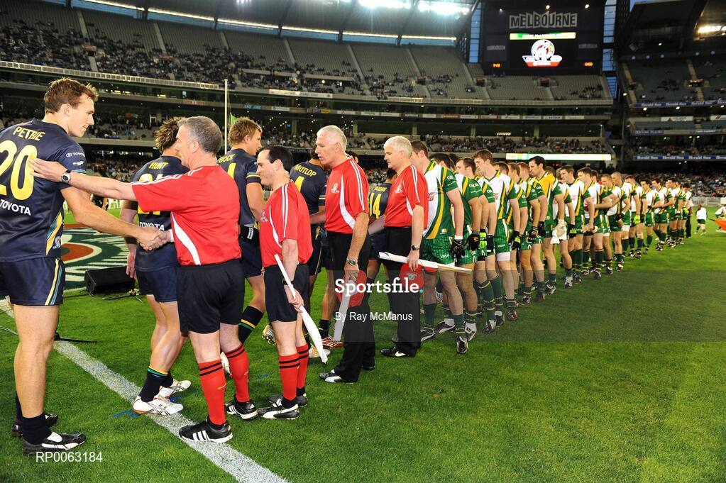 31 October 2008; Captain Sean Cavanagh and his Irish team-mates line up behind Irish match referee Pat McEnaney, linesman David Coldrick, Goal Umpires Gerry Kinneavey and John Bannon as they greet Drew Petrie,  Josh Hunt, Nathan Bock, Daniel Motlop and the Australian team before the start of the game. Toyota International Rules Series, Australia v Ireland, Melbourne Cricket Ground, Melbourne, Australia. Picture credit: Ray McManus / SPORTSFILE