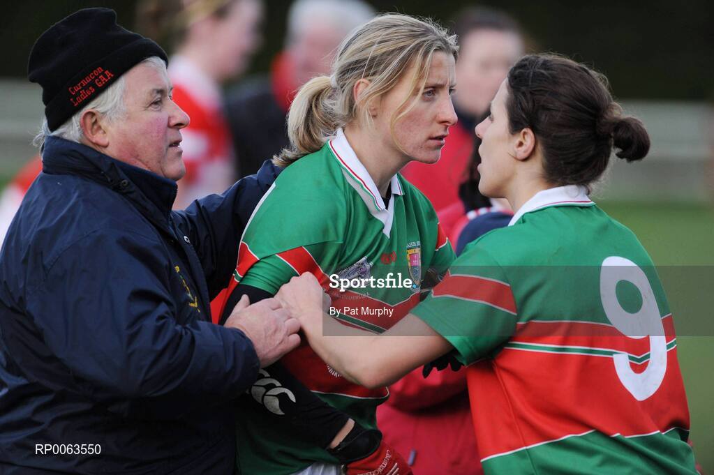 9 November 2008; Cora Staunton, Carnacon, is restrained by team manager Jimmy Corbett and team-mate Martha Carter as she attempted to confront referee Keith Delahunty after she was sin-bined during the final minute of the game. Vhi Healthcare All-Ireland Senior Club semi-final, Carnacon, Mayo v Donaghmoyne, Monaghan, Ray Prendergast Memorial Park, Clogher, Mayo. Picture credit: Pat Murphy / SPORTSFILE