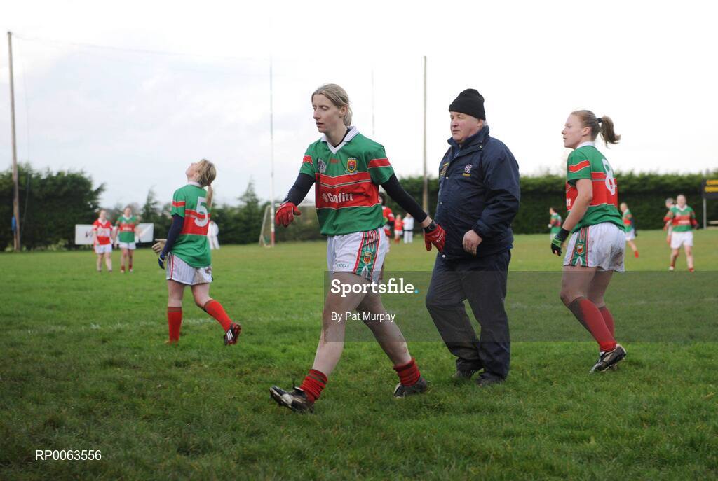 9 November 2008; Carnacon's Cora Staunton is escorted from the pitch by manager Jimmy Corbett after being sent to the sin-bin during the final minute of the game. Vhi Healthcare All-Ireland Senior Club semi-final, Carnacon, Mayo v Donaghmoyne, Monaghan, Ray Prendergast Memorial Park, Clogher, Mayo. Picture credit: Pat Murphy / SPORTSFILE