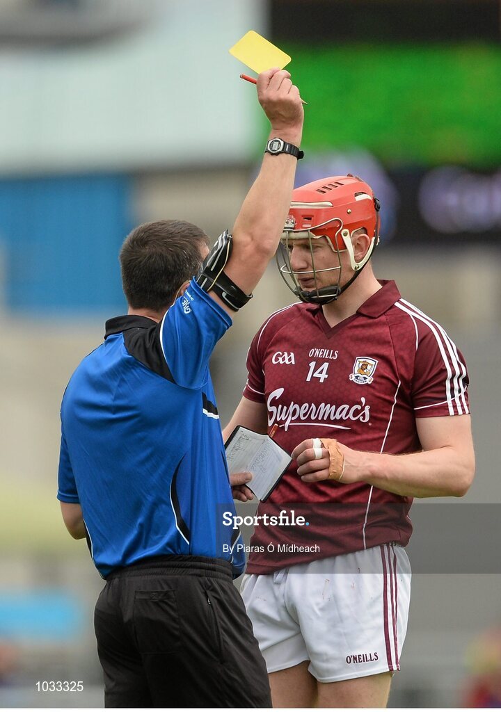 26 July 2015; Joe Canning, Galway, is shown the yellow card by referee James Owens. GAA Hurling All-Ireland Senior Championship, Quarter-Final, Galway v Cork. Semple Stadium, Thurles, Co. Tipperary. Picture credit: Piaras Ó Mídheach / SPORTSFILE