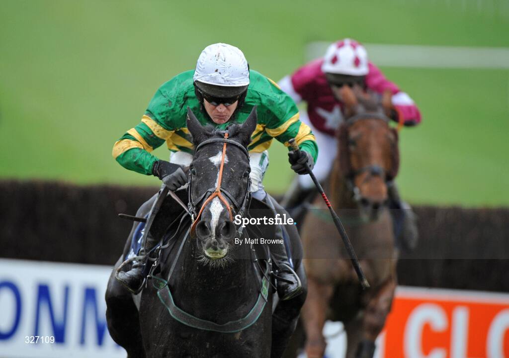 13 November 2008; Glenfinn Captain, with Barry Geraghty up, after jumping the last on the way to winning the Clonmel Oil Steeplechase from second place One Cool Cookie with David Casey up. Clonmel racecourse, Clonmel, Co. Tipperary. Picture credit: Matt Browne / SPORTSFILE