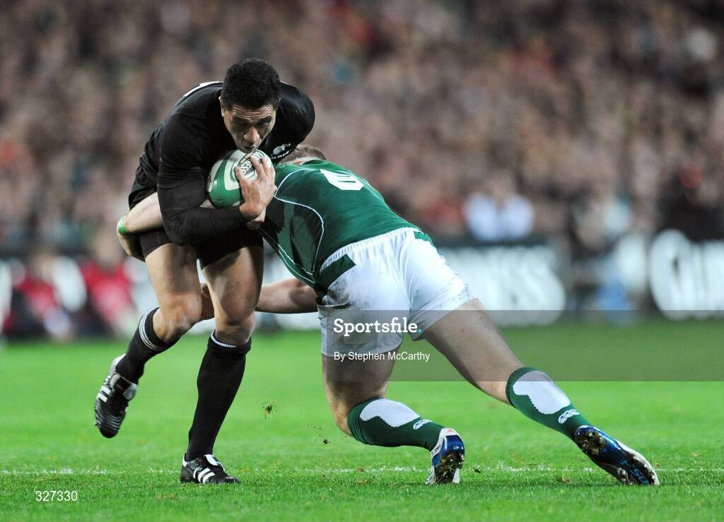 15 November 2008; Mils Muliaina, New Zealand, is tackled by Jamie Heaslip, Ireland. Guinness Autumn Internationals, Ireland v New Zealand, Croke Park, Dublin. Picture credit: Stephen McCarthy / SPORTSFILE