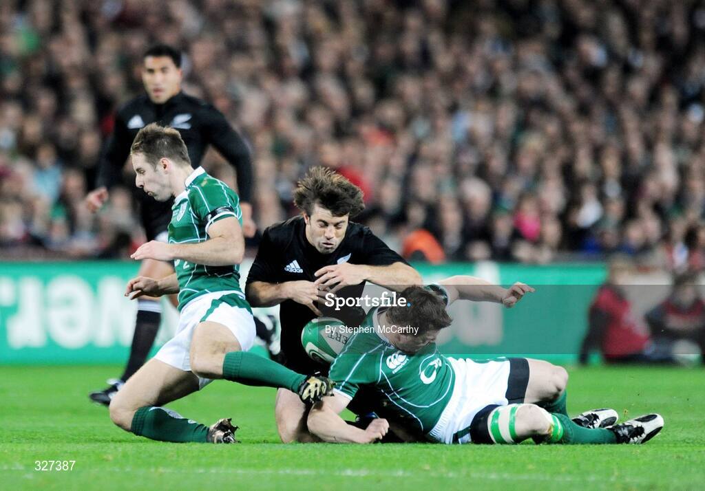 15 November 2008; Conrad Smith, New Zealand, in action against Tomas O'Leary, left, and Brian O'Driscoll, Ireland. Guinness Autumn Internationals, Ireland v New Zealand, Croke Park, Dublin. Picture credit: Stephen McCarthy / SPORTSFILE