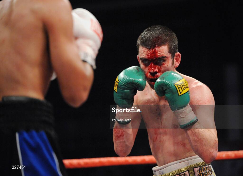15 November 2008; Bernard Dunne continues to fight despite suffering a cut to the head from Cristian Faccio, which ultimately resulted in the fight being stopped. Hunky Dory Fight Night, Breaffy House Hotel, Mayo. Picture credit: Ray Ryan / SPORTSFILE