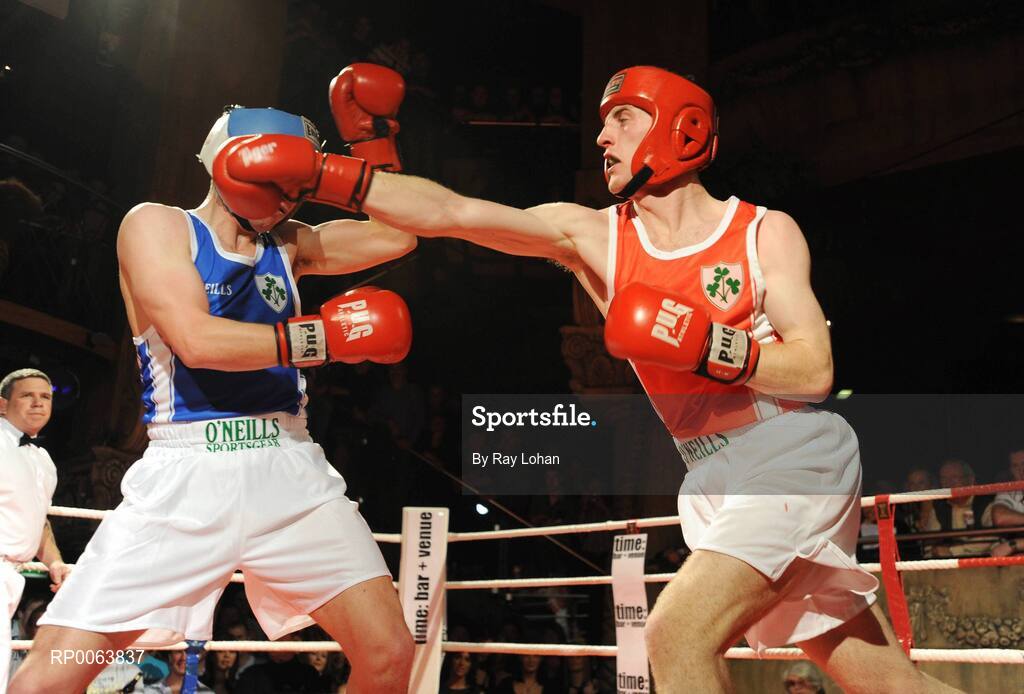 15 November 2008; Alan Smith, red, Sarsfields, in action against Eamonn Callaghan, Naas. TV3 Kildare GAA Fight Night, Time: bar + venue, Naas, Co. Kildare. Picture credit: Ray Lohan / SPORTSFILE  *** Local Caption ***