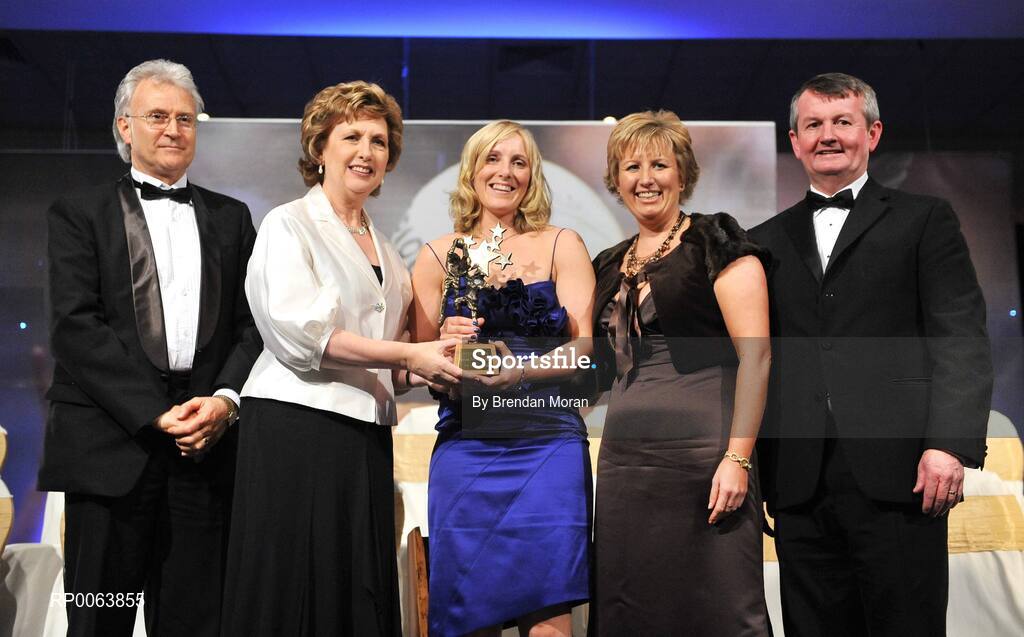 15 November 2008; Elaine Harte, from Cork, is presented with her All-Star award by President Mary McAleese, in the company of, from left, Tony Towell, O'Neills, Geraldine Giles, President, Cumann Peil na mBan and Pol O Gallchoir, Ceannsai, TG4. TG4 O'Neill's Ladies Football All-Stars Awards, Citywest Hotel, Dublin. Picture credit: Brendan Moran / SPORTSFILE