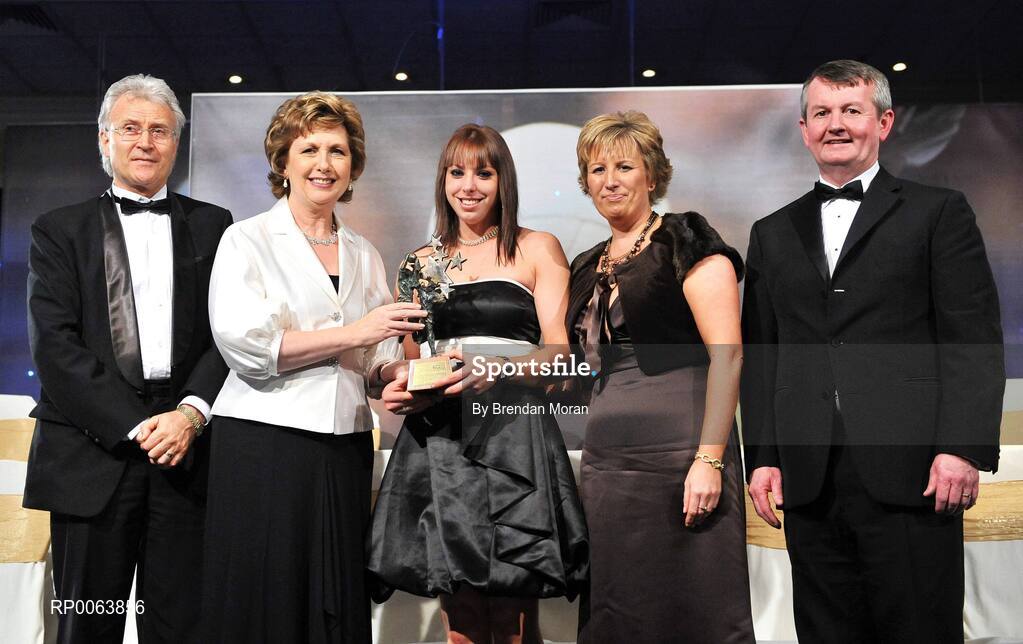 15 November 2008; Linda Barrett, from Cork, is presented with her All-Star award by President Mary McAleese, in the company of, from left, Tony Towell, O'Neills, Geraldine Giles, President, Cumann Peil na mBan and Pol O Gallchoir, Ceannsai, TG4. TG4 O'Neill's Ladies Football All-Stars Awards, Citywest Hotel, Dublin. Picture credit: Brendan Moran / SPORTSFILE