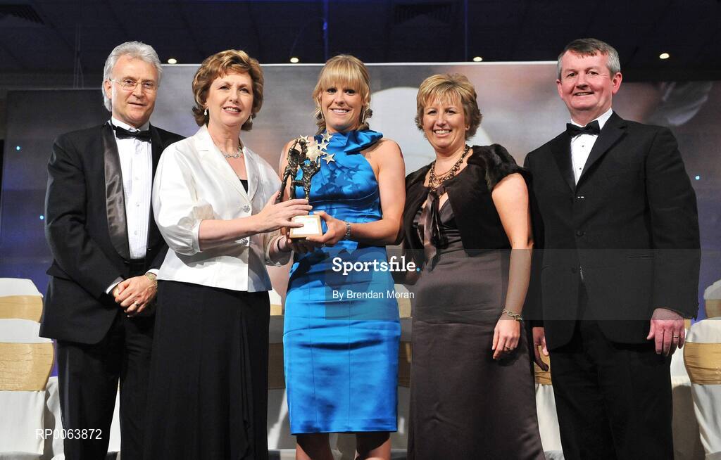 15 November 2008; Angela Walsh of Cork, is presented with her All-Star award by President Mary McAleese, in the company of, from left, Tony Towell, O'Neills, Geraldine Giles, President, Cumann Peil na mBan and Pol O Gallchoir, Ceannsai, TG4. TG4 O'Neill's Ladies Football All-Stars Awards, Citywest Hotel, Dublin. Picture credit: Brendan Moran / SPORTSFILE