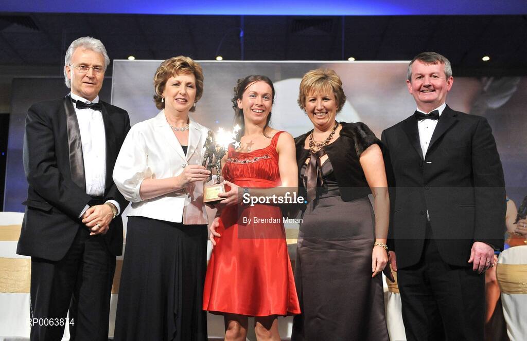 15 November 2008; Sharon Courtney of Monaghan, is presented with her All-Star award by President Mary McAleese, in the company of, from left, Tony Towell, O'Neills, Geraldine Giles, President, Cumann Peil na mBan and Pol O Gallchoir, Ceannsai, TG4. TG4 O'Neill's Ladies Football All-Stars Awards, Citywest Hotel, Dublin. Picture credit: Brendan Moran / SPORTSFILE
