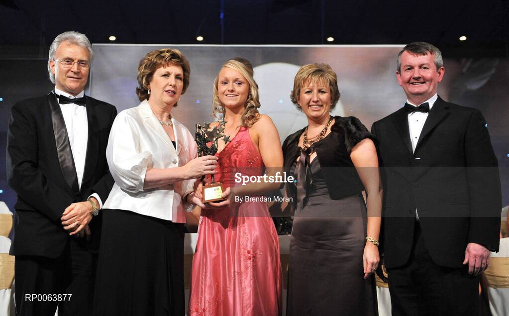 15 November 2008; Neamh Woods of Tyrone, is presented with her All-Star award by President Mary McAleese, in the company of, from left, Tony Towell, O'Neills, Geraldine Giles, President, Cumann Peil na mBan and Pol O Gallchoir, Ceannsai, TG4. TG4 O'Neill's Ladies Football All-Stars Awards, Citywest Hotel, Dublin. Picture credit: Brendan Moran / SPORTSFILE