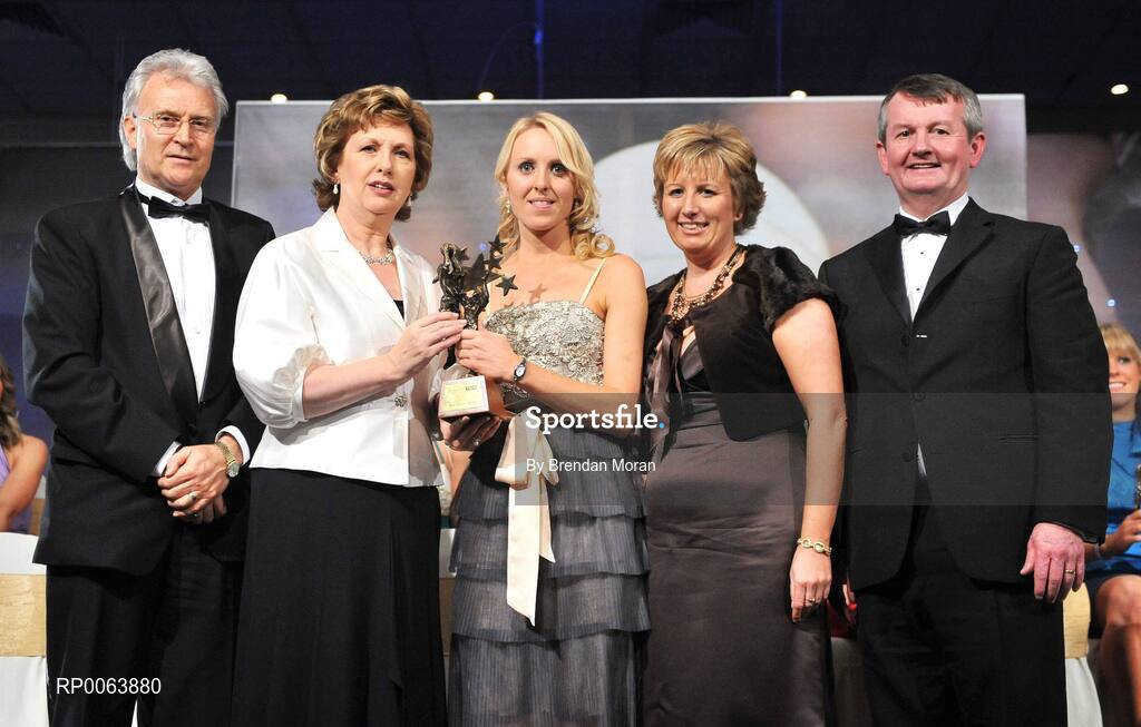 15 November 2008; Nollaig Cleary of Cork, is presented with her All-Star award by President Mary McAleese, in the company of, from left, Tony Towell, O'Neills, Geraldine Giles, President, Cumann Peil na mBan and Pol O Gallchoir, Ceannsai, TG4. TG4 O'Neill's Ladies Football All-Stars Awards, Citywest Hotel, Dublin. Picture credit: Brendan Moran / SPORTSFILE
