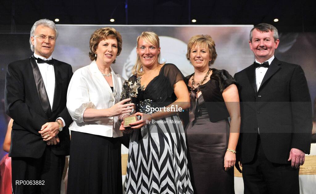 15 November 2008; Michaela Downey of Down, is presented with her All-Star award by President Mary McAleese, in the company of, from left, Tony Towell, O'Neills, Geraldine Giles, President, Cumann Peil na mBan and Pol O Gallchoir, Ceannsai, TG4. TG4 O'Neill's Ladies Football All-Stars Awards, Citywest Hotel, Dublin. Picture credit: Brendan Moran / SPORTSFILE